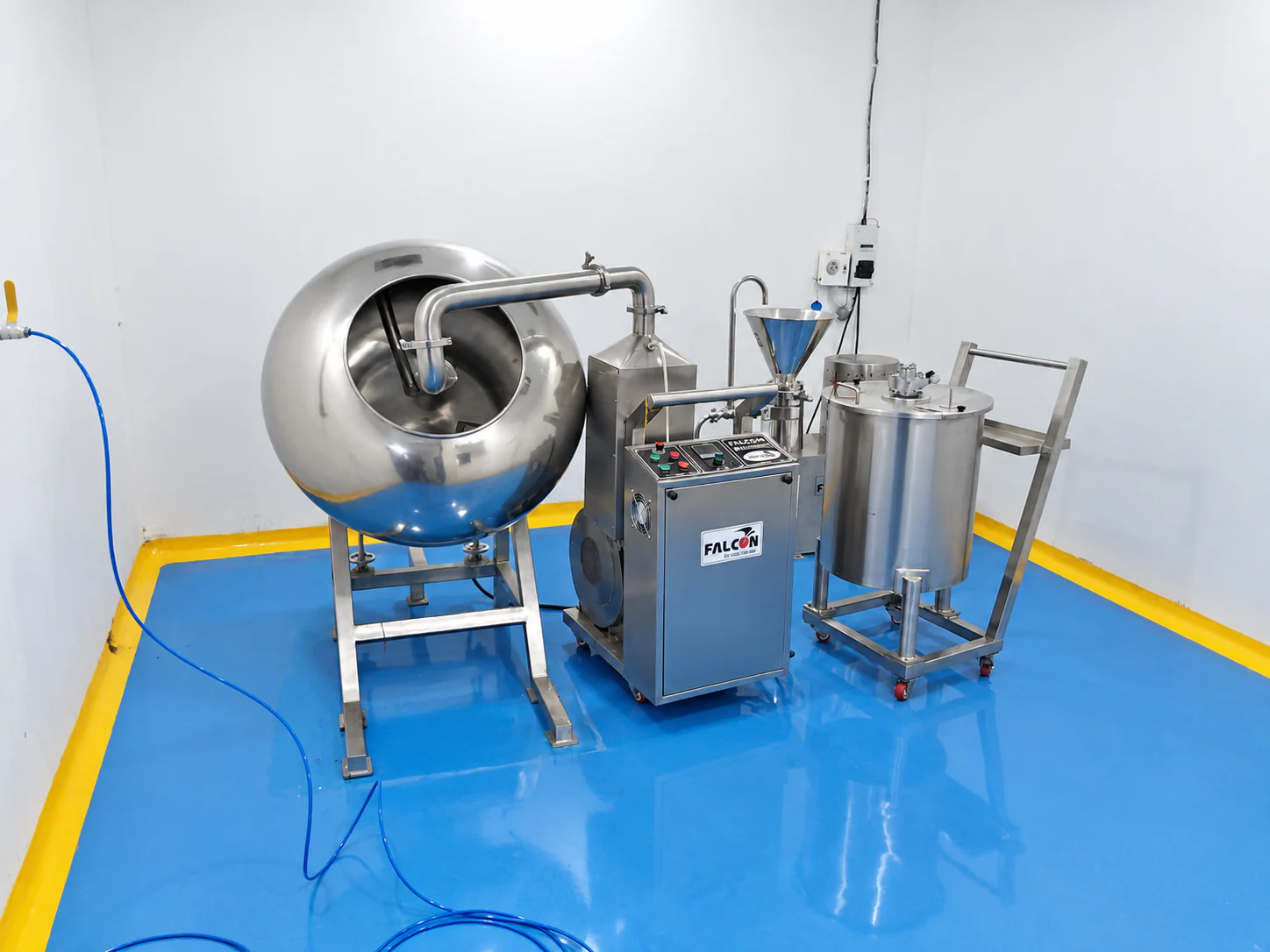 Stainless-steel processing equipment arranged inside a Healthy Health manufacturing room