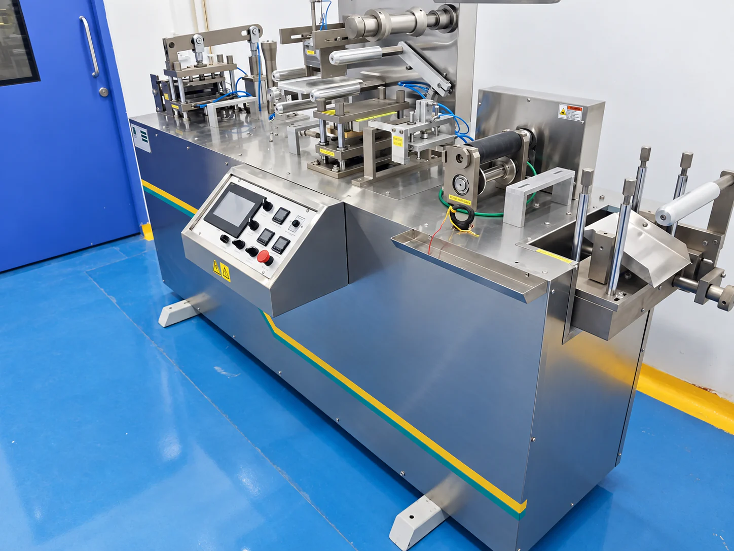 Stainless-steel packaging line and controls inside the Healthy Health facility